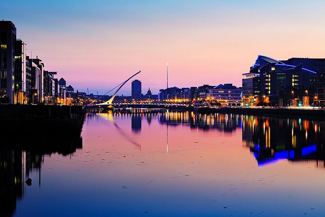 Dublin Live Guided Panoramic Open-Top Night Bus Tour - Following the Liffey toward the Docklands